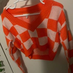 BP orange checkered sweater